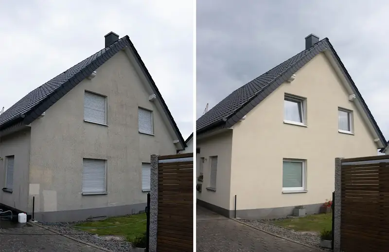 Einfamilienhaus in Bielefeld, links grau verschmutzter Giebel, rechts nach der Reinigung